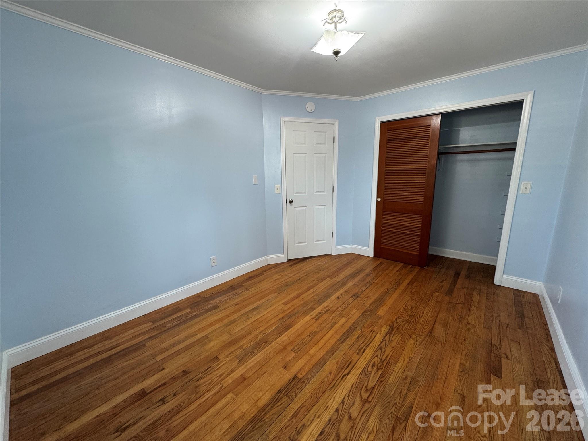 1307 Armstrong Road Belmont, NC 28012 - Photo 10 of 15 a view of empty room with wooden floor