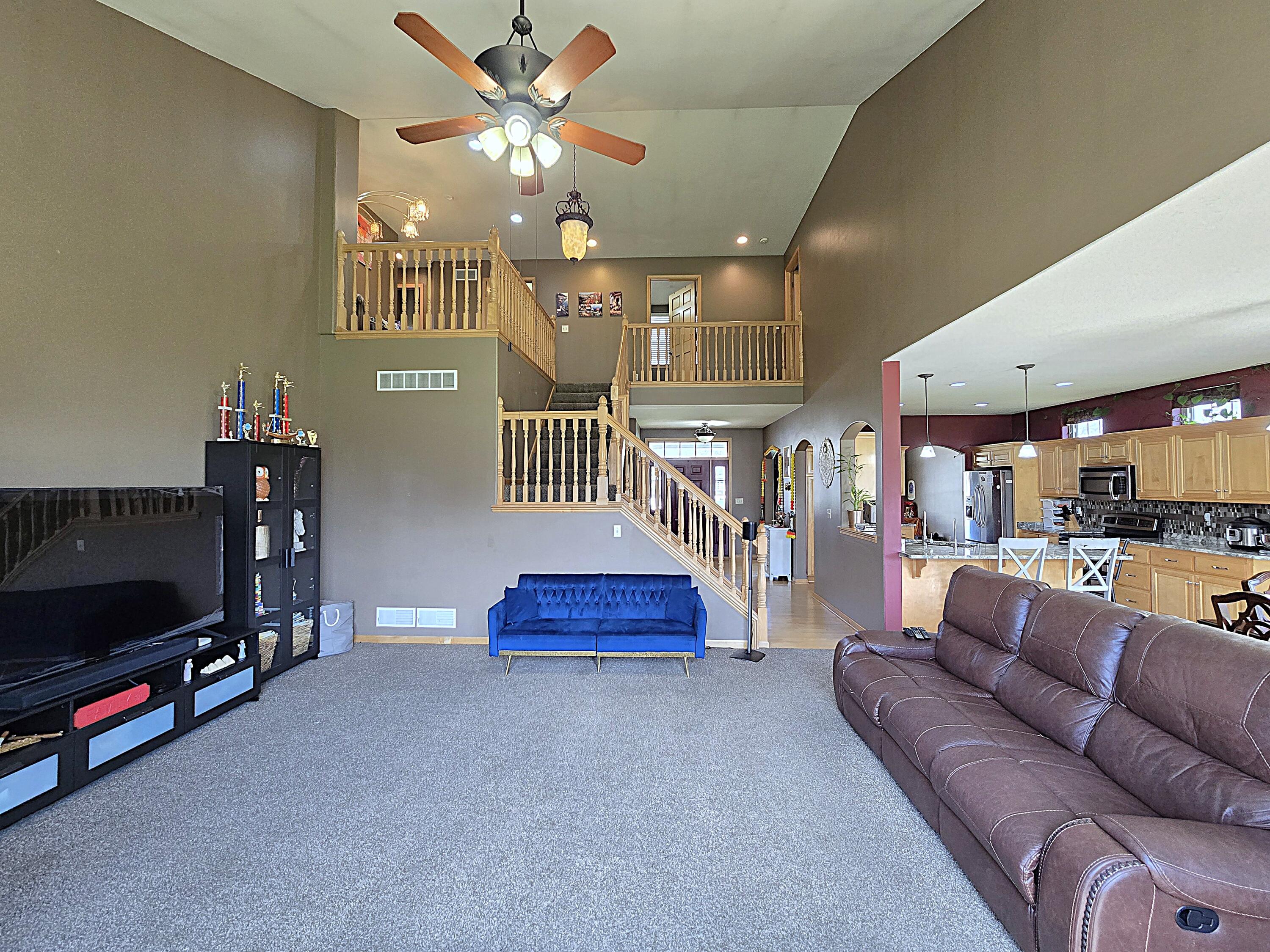 9729 West Prairie Grass Way Franklin, WI 53132 - Photo 18 of 73 Living Room