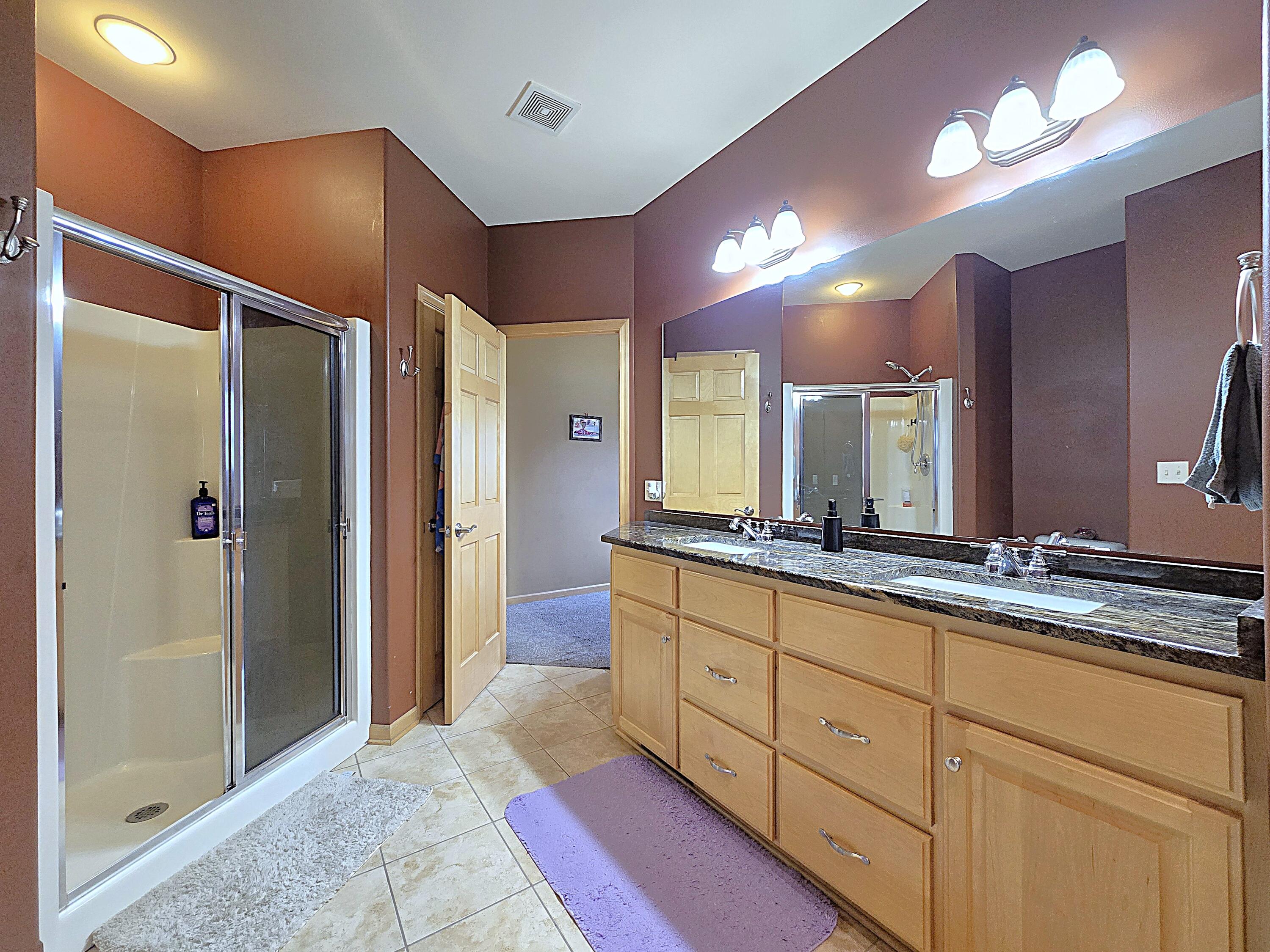 9729 West Prairie Grass Way Franklin, WI 53132 - Photo 28 of 73 Primary Bathroom