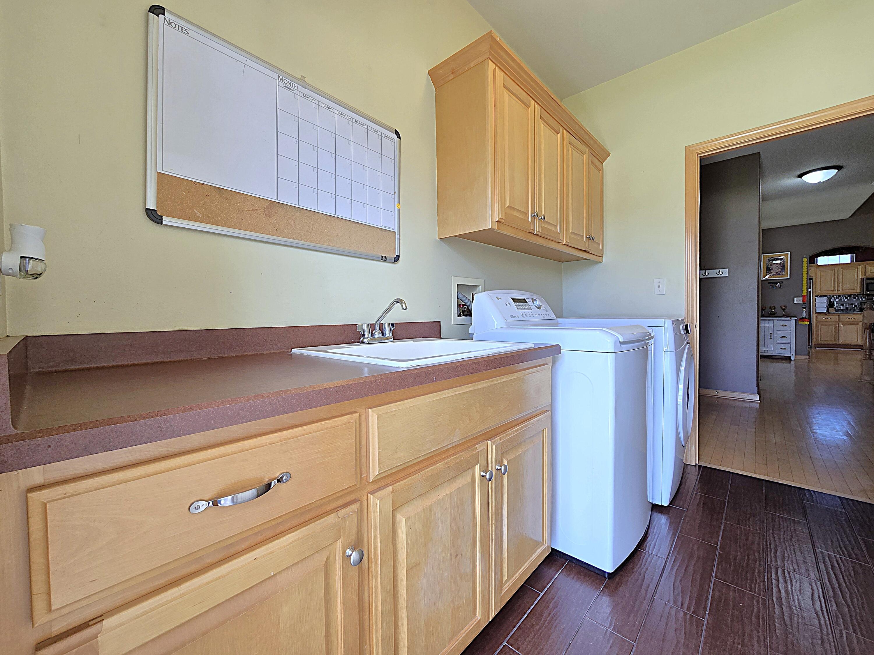 9729 West Prairie Grass Way Franklin, WI 53132 - Photo 64 of 73 Main Floor Laundry