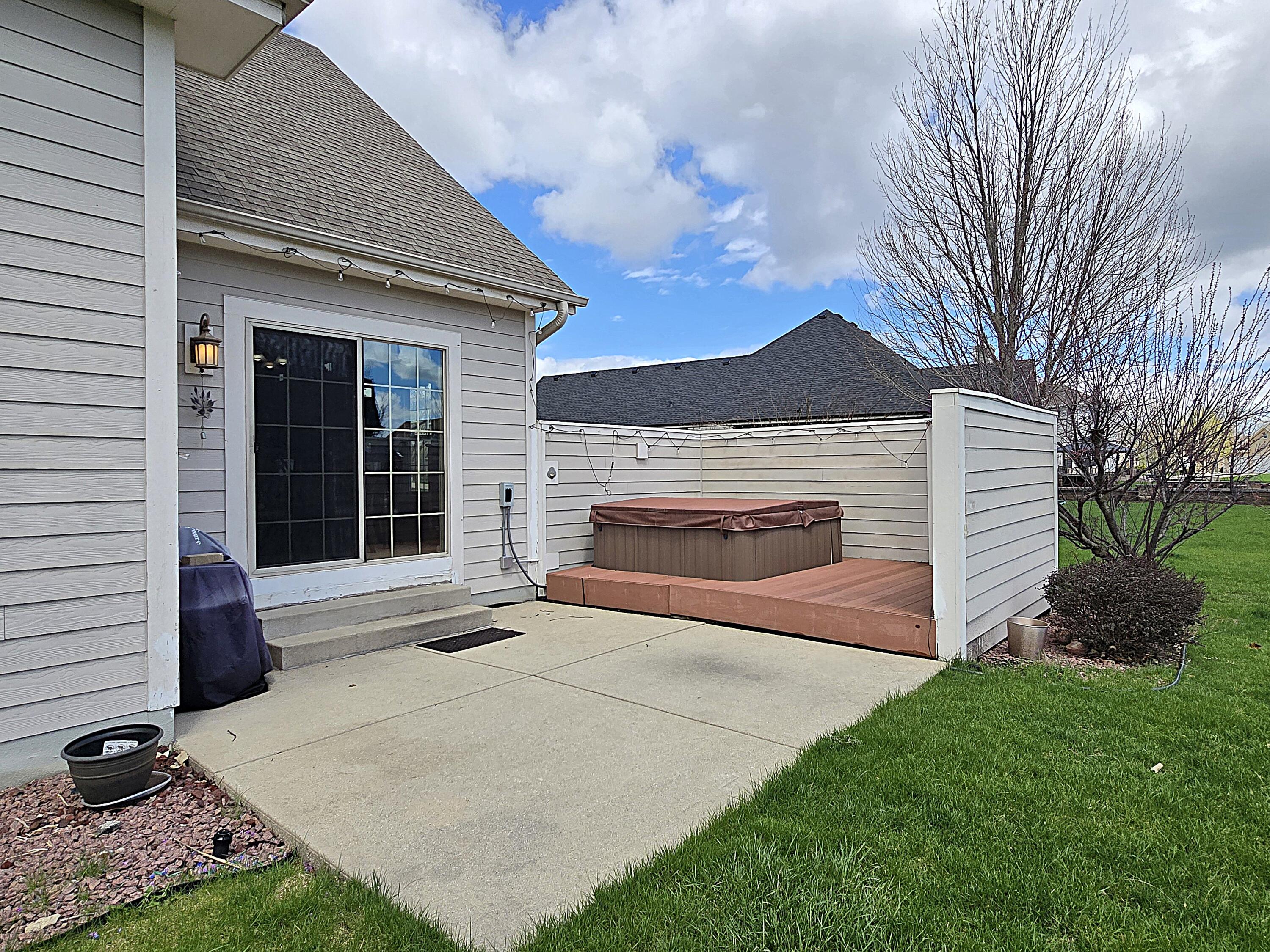 9729 West Prairie Grass Way Franklin, WI 53132 - Photo 70 of 73 Hot Tub and Patio