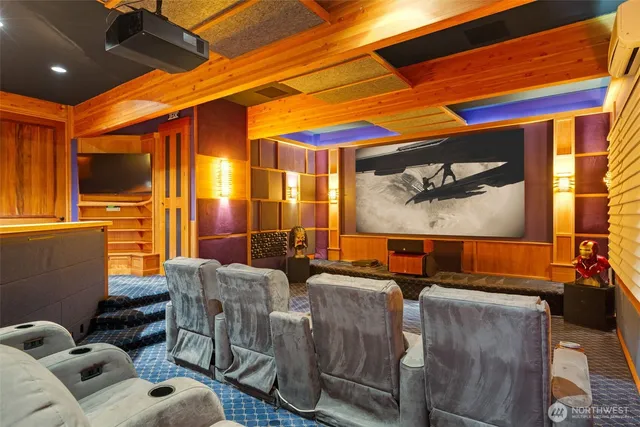 a projector room with furniture and a window