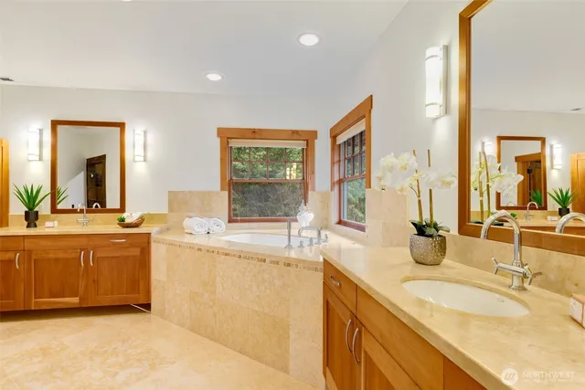 a view of a balcony with lake view and a potted plant