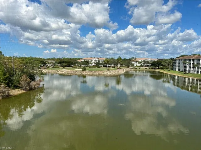 a view of a workspace with furniture