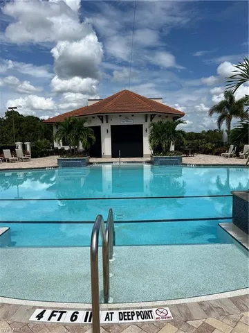 a view of a backyard with a patio