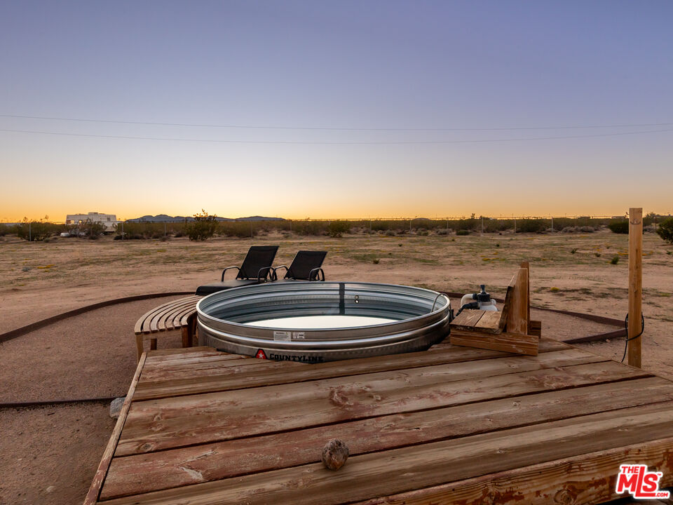 2724 Stonehill Avenue Joshua Tree, CA 92252 - Photo 51 of 65 a view of a lake with a big yard