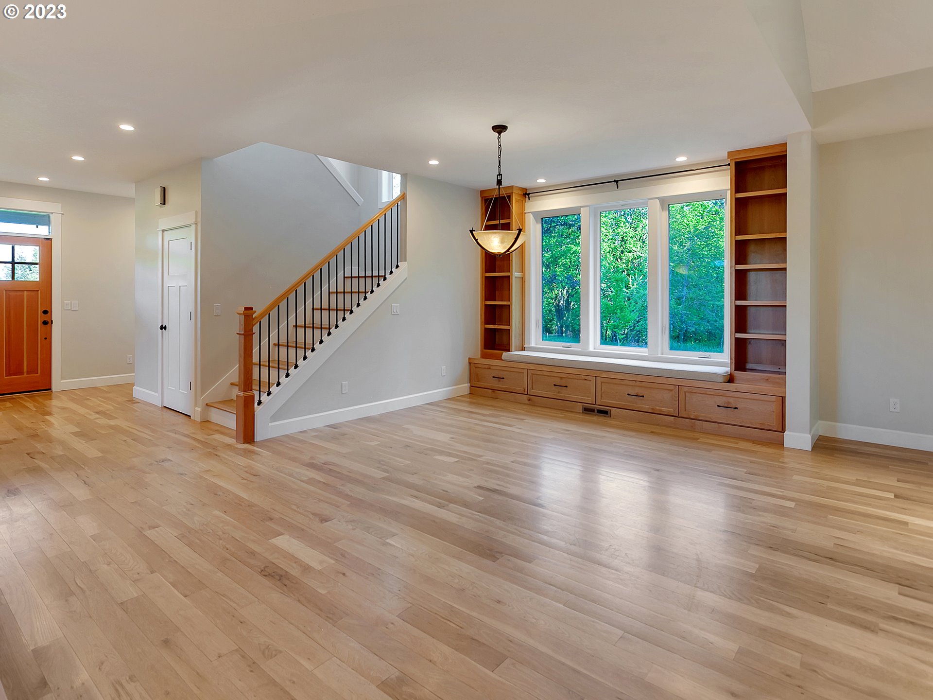 16939 Southwest Wilsonville Road Wilsonville, OR 97070 - Photo 12 of 43 a view of an empty room with wooden floor and a window