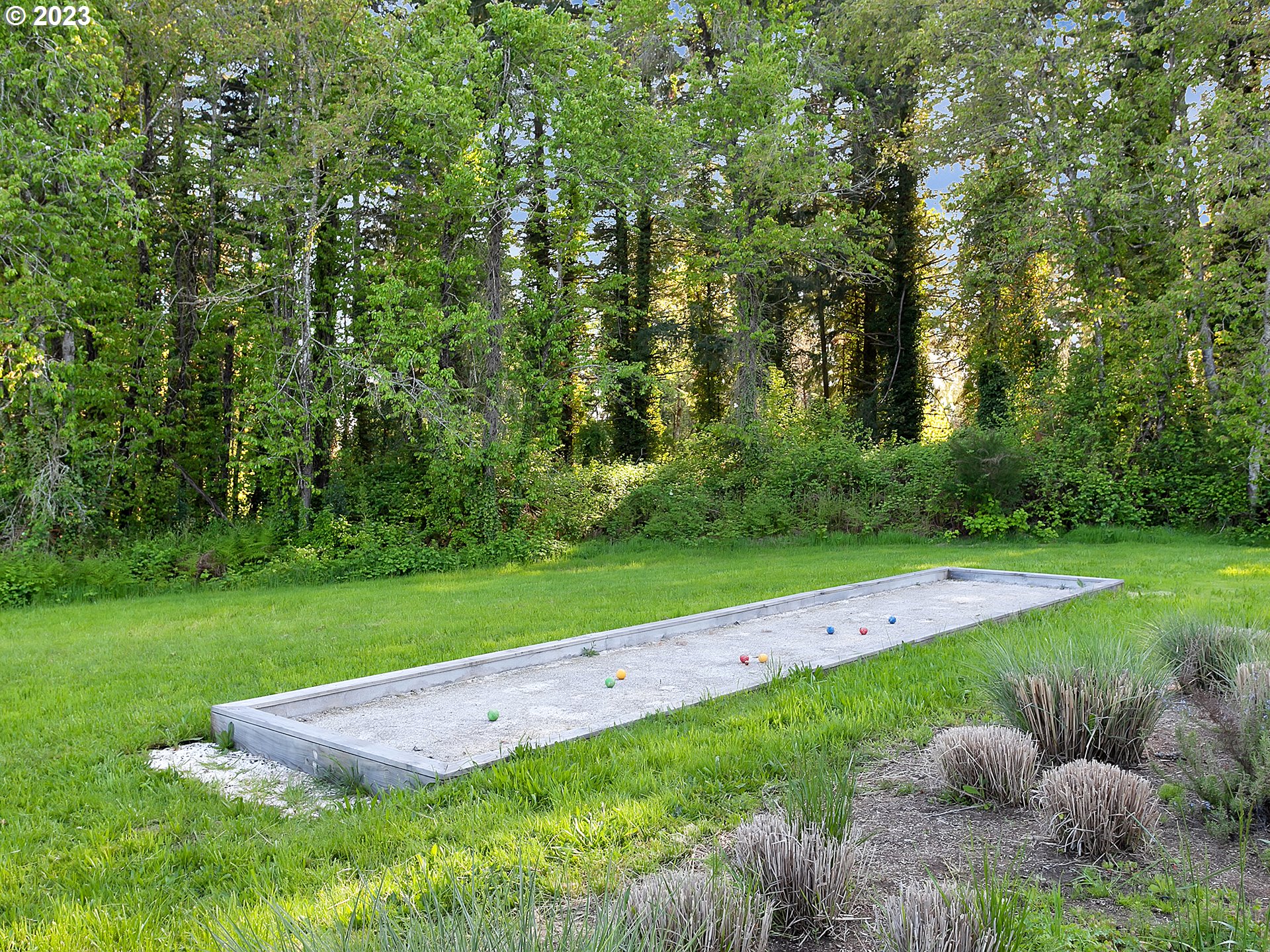 16939 Southwest Wilsonville Road Wilsonville, OR 97070 - Photo 27 of 43 a view of a garden with an outdoor space