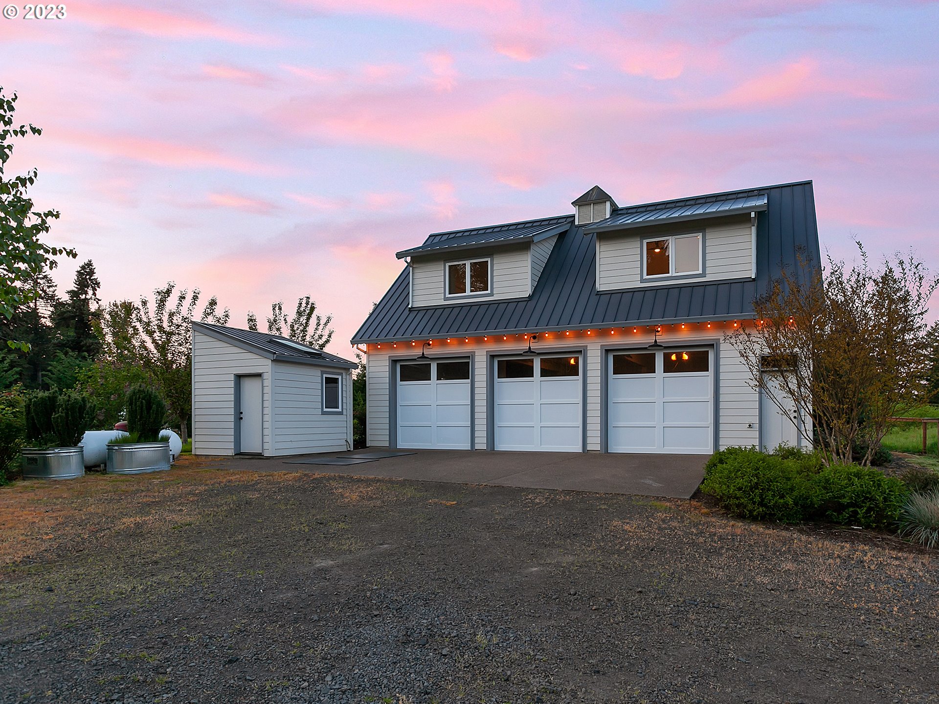16939 Southwest Wilsonville Road Wilsonville, OR 97070 - Photo 32 of 43 a front view of a house with a yard