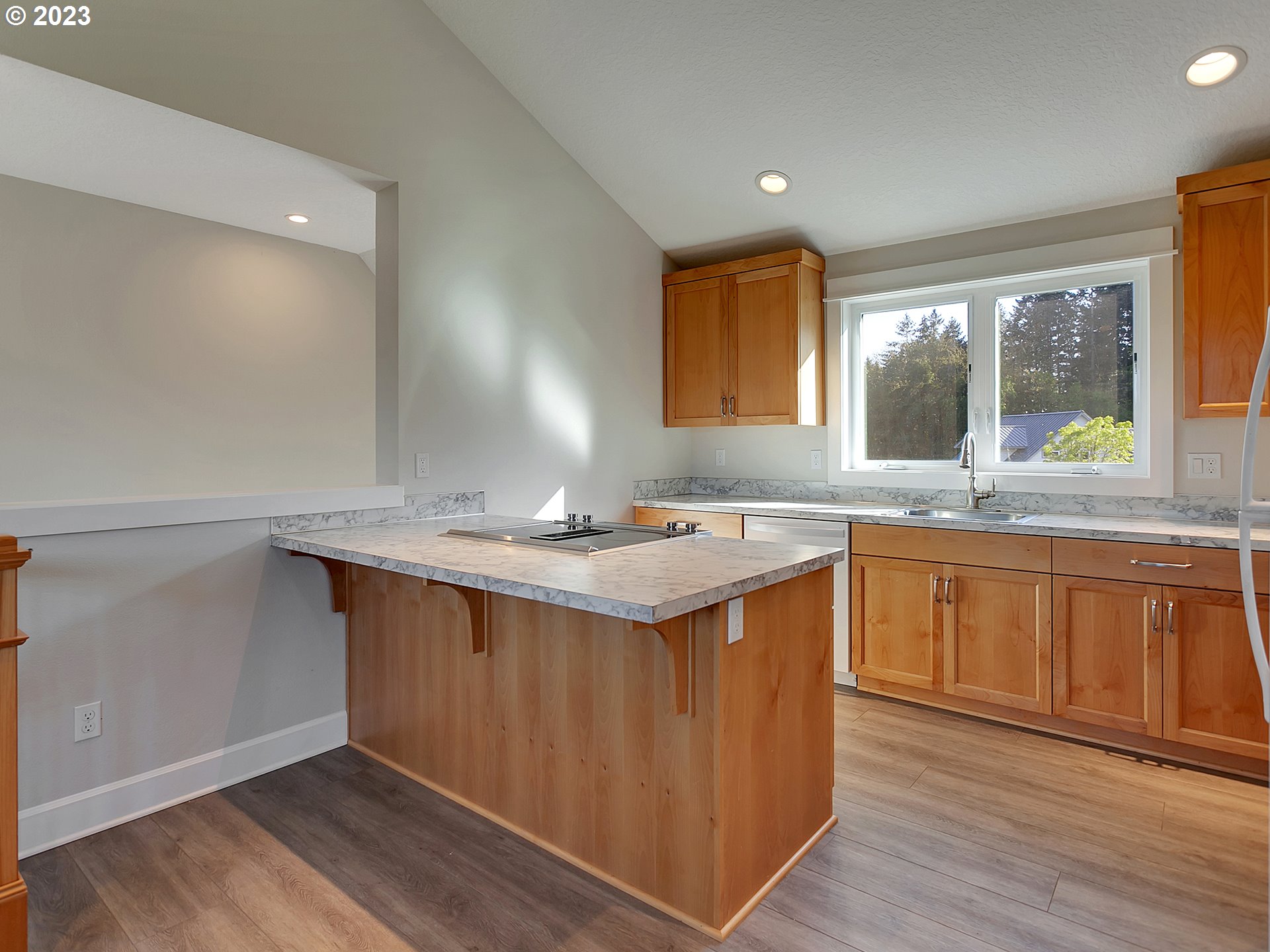 16939 Southwest Wilsonville Road Wilsonville, OR 97070 - Photo 34 of 43 a kitchen with a sink stove and cabinets
