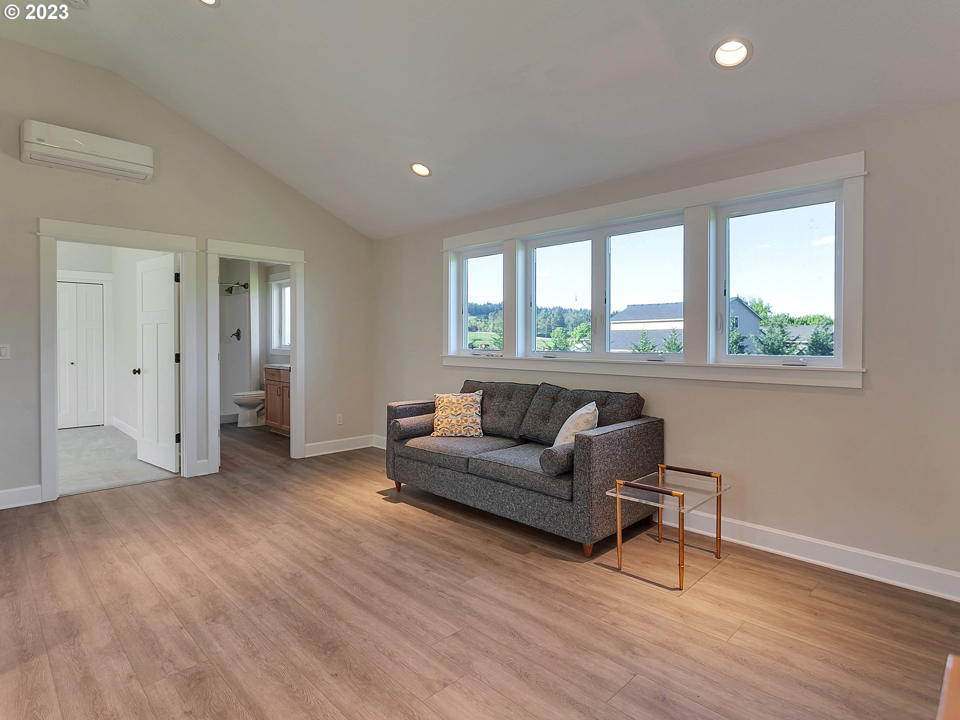16939 Southwest Wilsonville Road Wilsonville, OR 97070 - Photo 36 of 43 a living room with furniture and a large window