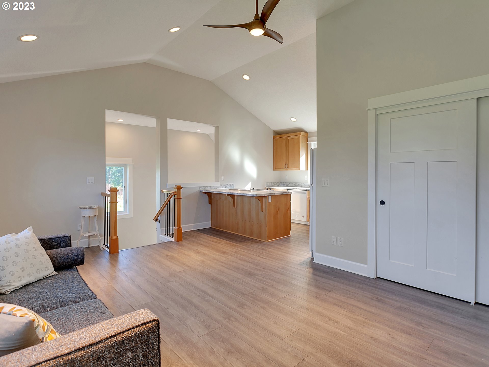 16939 Southwest Wilsonville Road Wilsonville, OR 97070 - Photo 37 of 43 a living room with furniture and a wooden floor