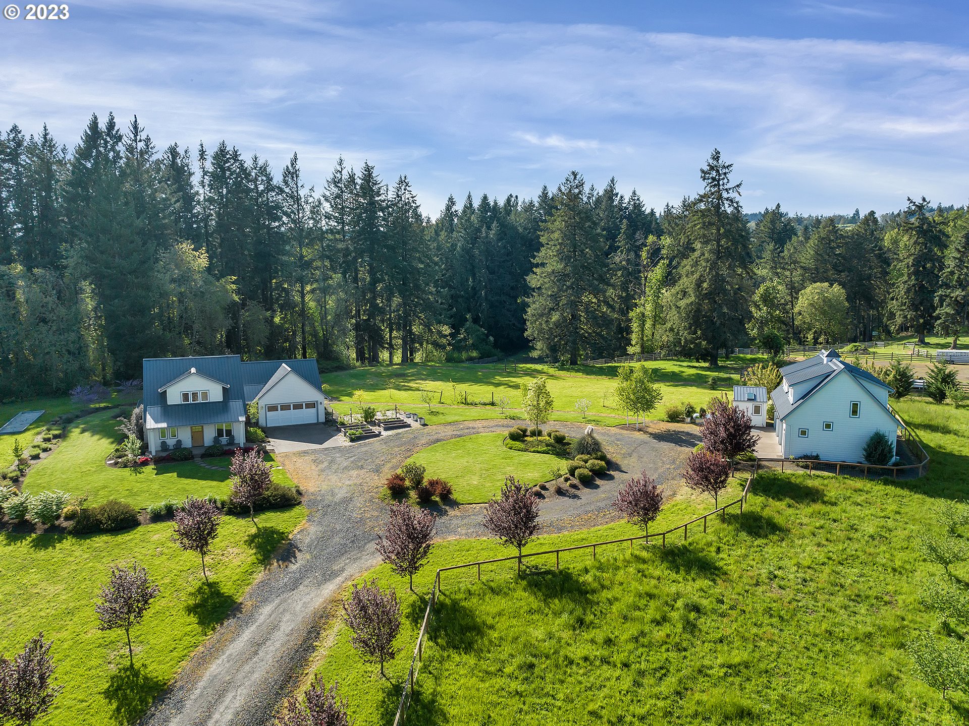 16939 Southwest Wilsonville Road Wilsonville, OR 97070 - Photo 4 of 43 an aerial view of a house with garden space and swimming pool