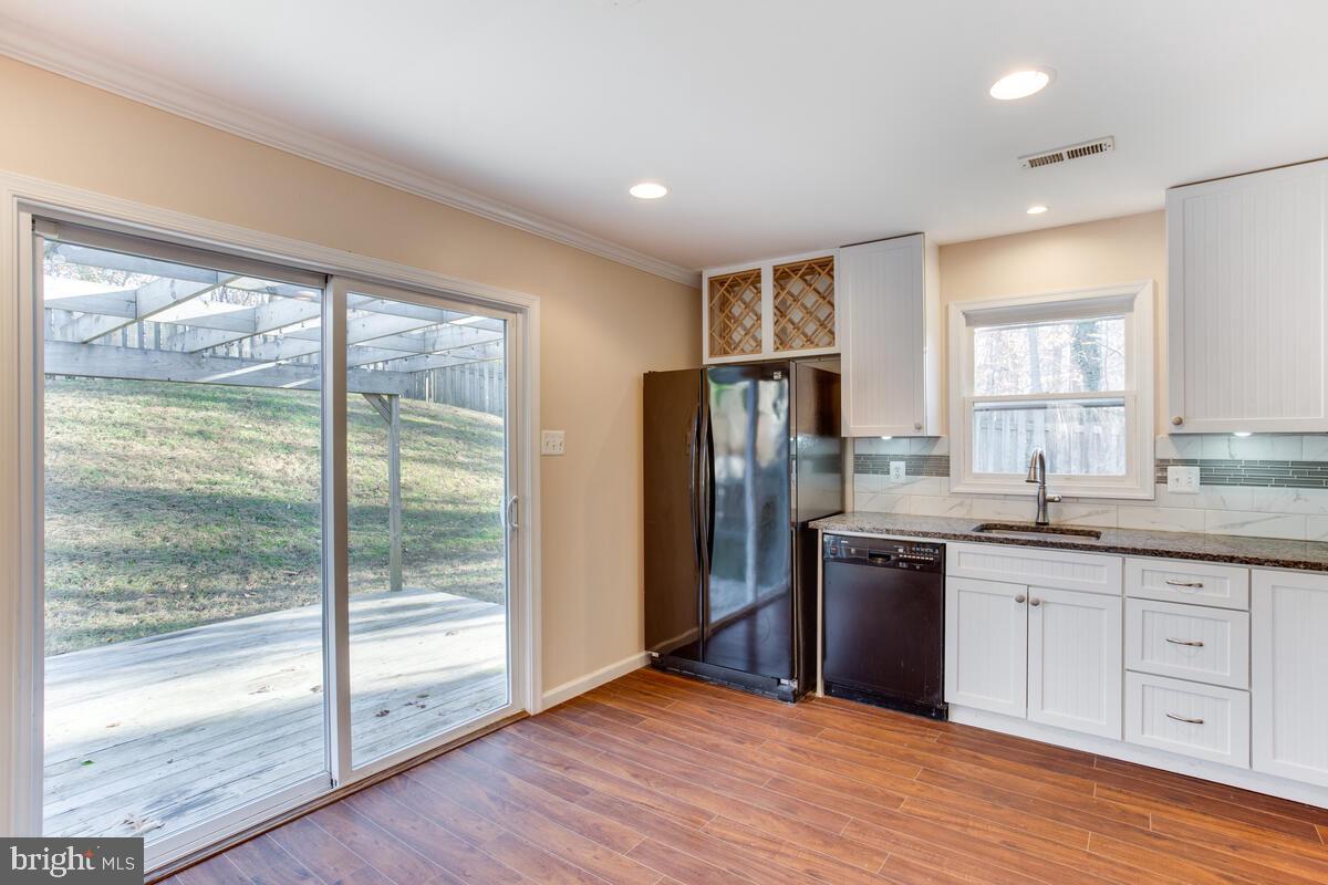 1181 Dares Beach Road Prince Frederick, MD 20678 - Photo 13 of 31 large sliding door to side deck