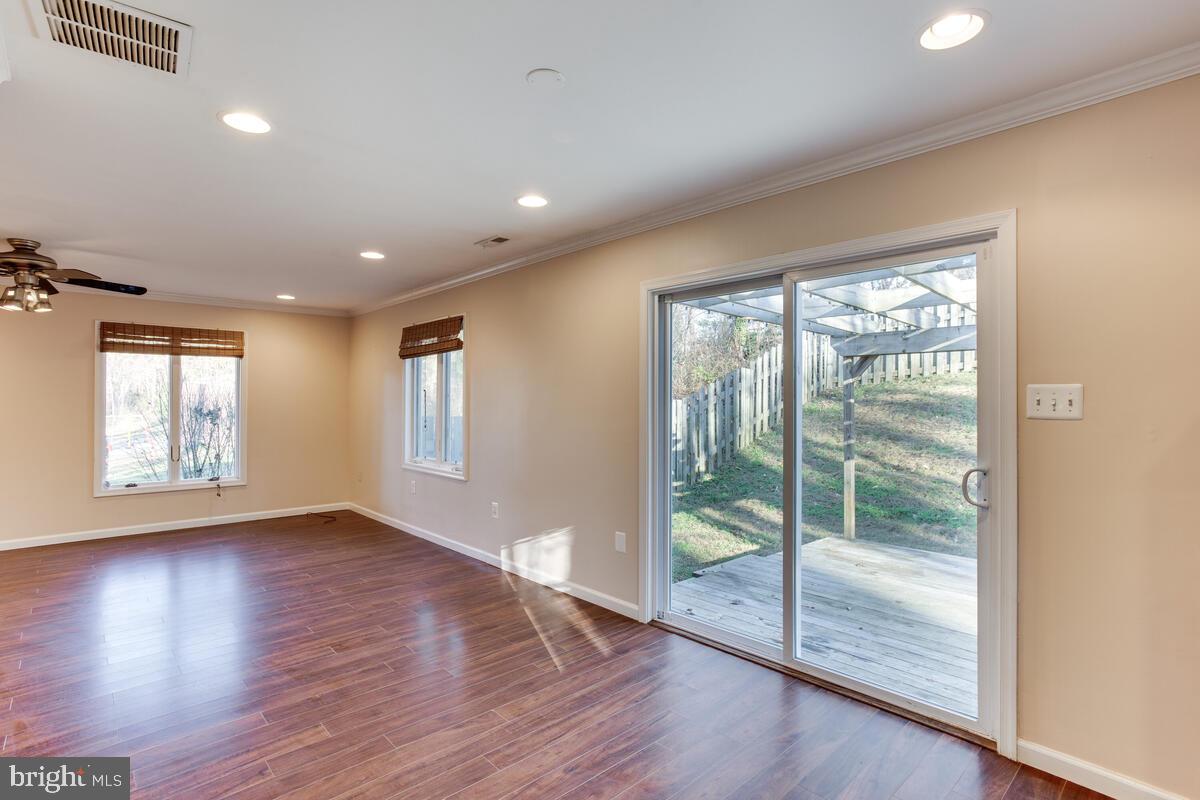 1181 Dares Beach Road Prince Frederick, MD 20678 - Photo 24 of 31 dining area with large sliding door to deck