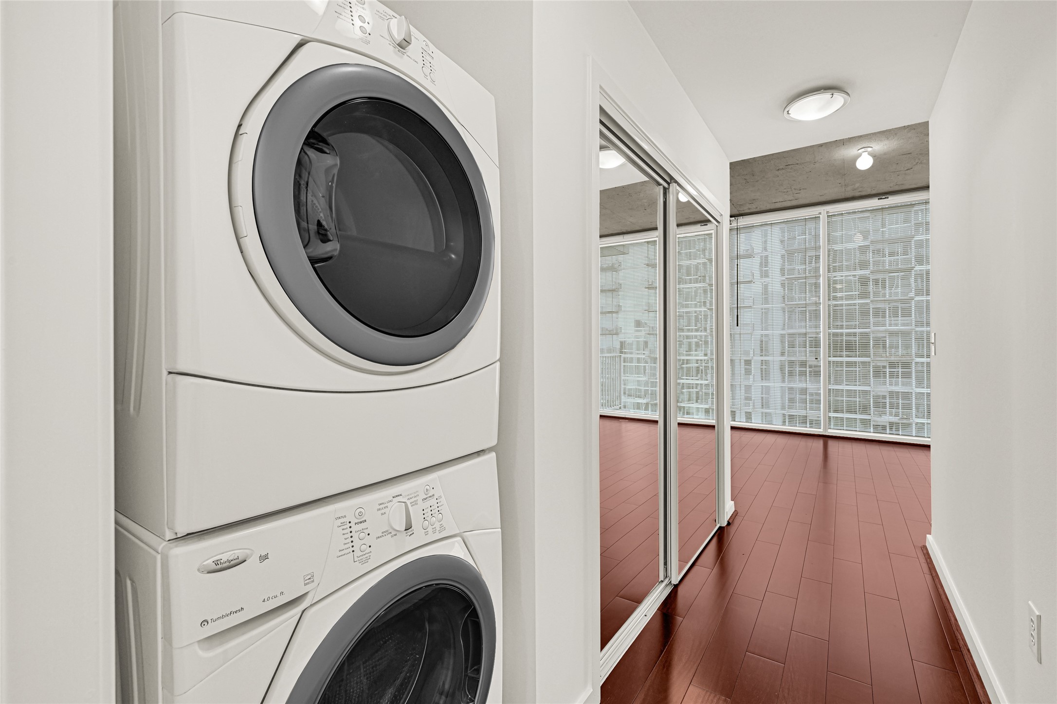 5925 Almeda Road, Unit 11508 Houston, TX 77004 - Photo 16 of 44 a view of a hallway with washer and dryer