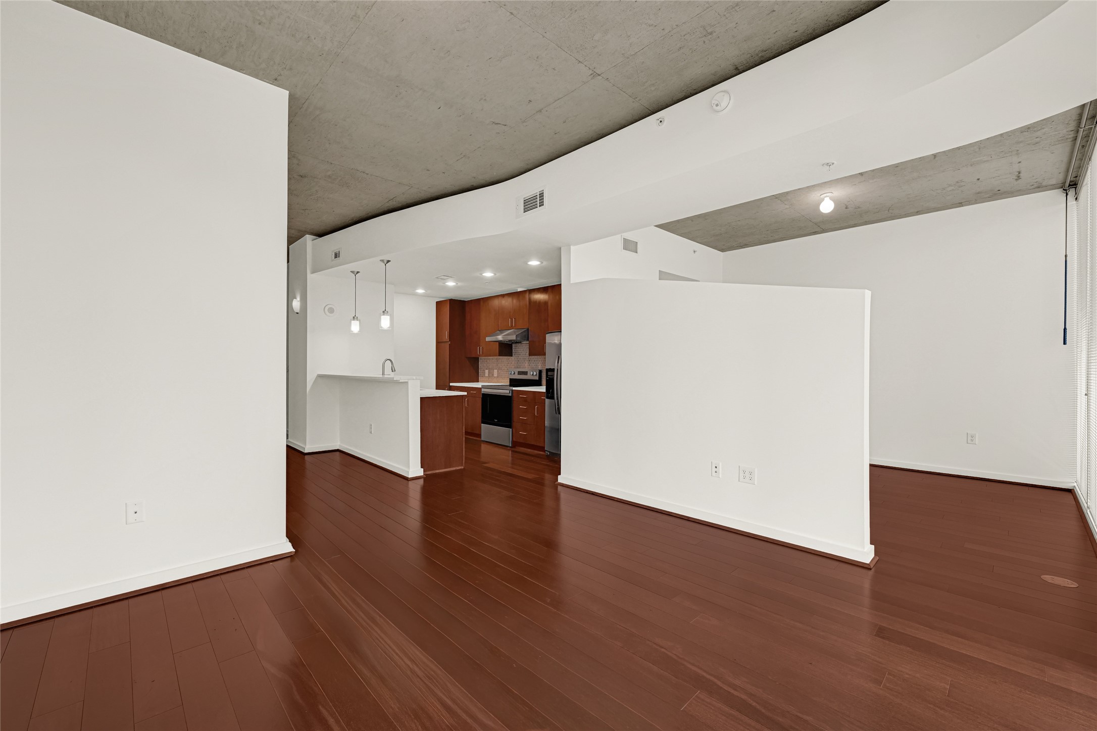 5925 Almeda Road, Unit 11508 Houston, TX 77004 - Photo 3 of 44 a view of empty room with wooden floor