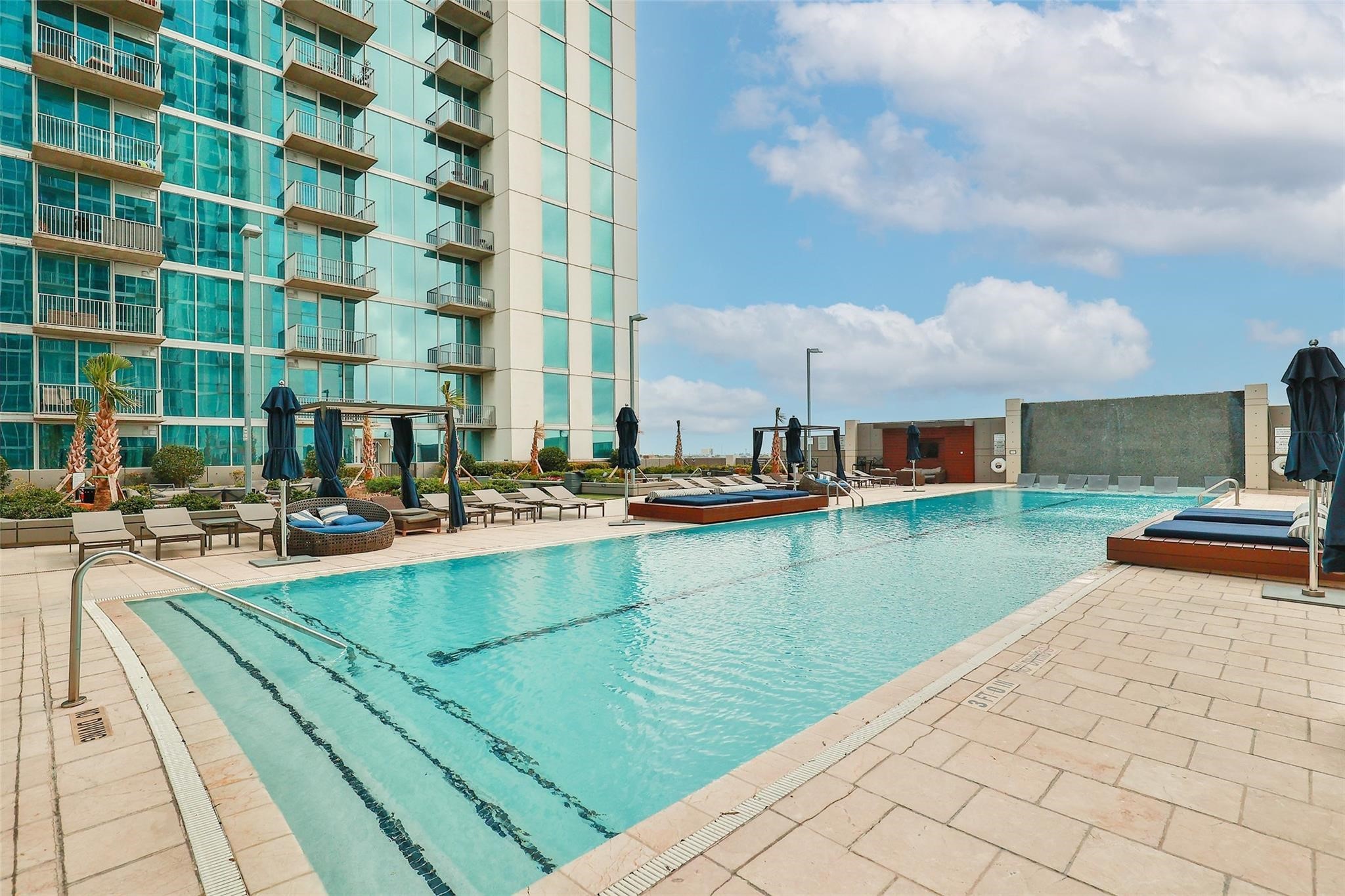 5925 Almeda Road, Unit 11508 Houston, TX 77004 - Photo 32 of 44 a view of swimming pool with outdoor seating