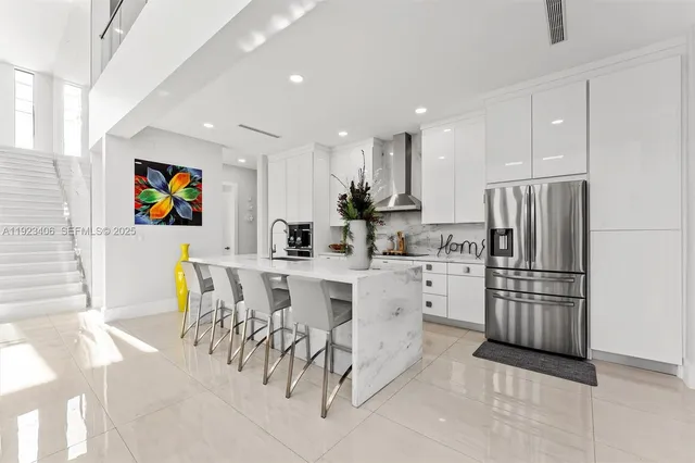 a patio with a table and chairs