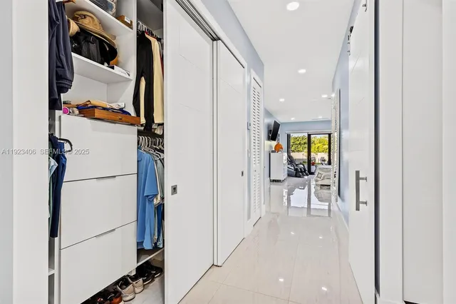 an aerial view of a house with a garden and swimming pool