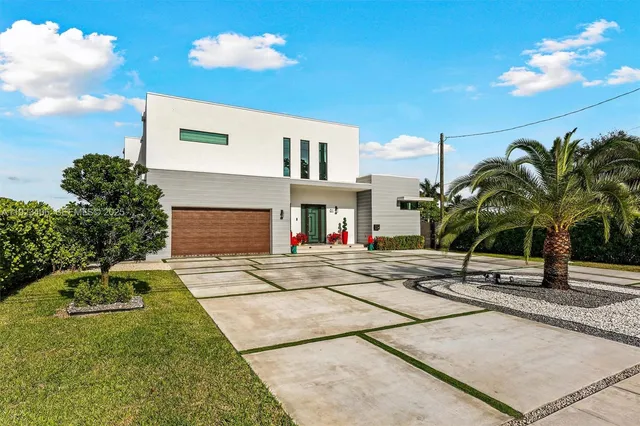 a living room with furniture and flat screen tv