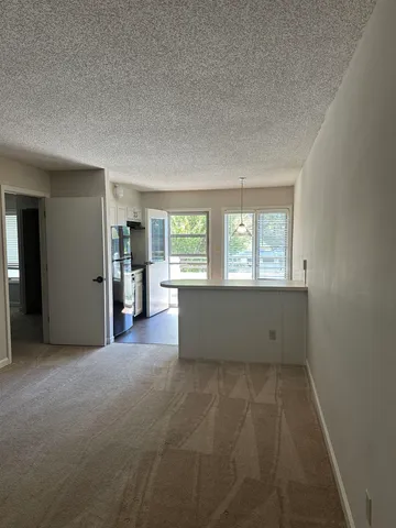 an empty room with windows