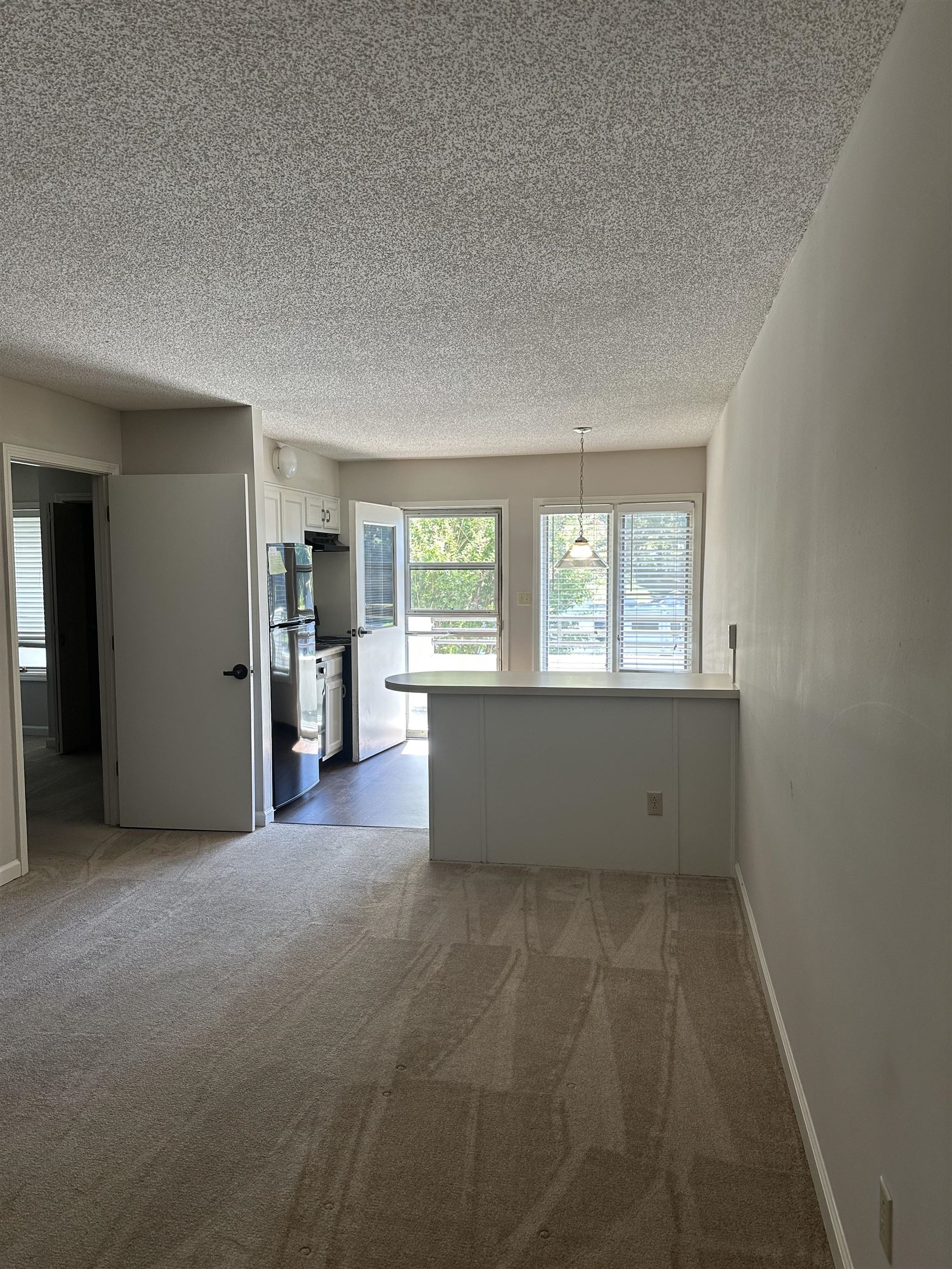 3589 Covington Pike, Unit 214 Memphis, TN 38128 - Photo 5 of 12 an empty room with windows