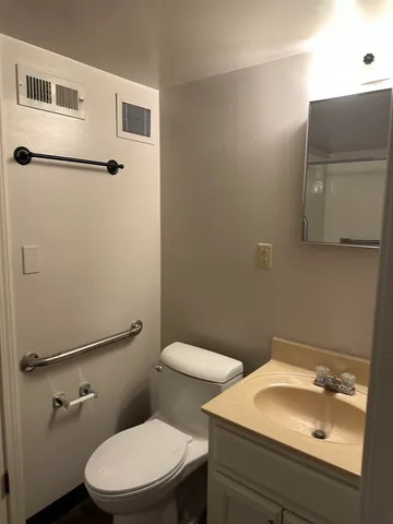 a bathroom with a bath tub