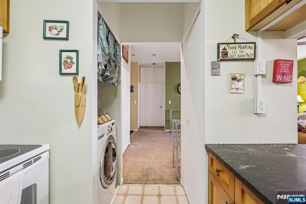 111 Mulberry Street, Unit 2V Newark, NJ 07102 - Photo 12 of 27 a view of a storage and utility room with a fridge