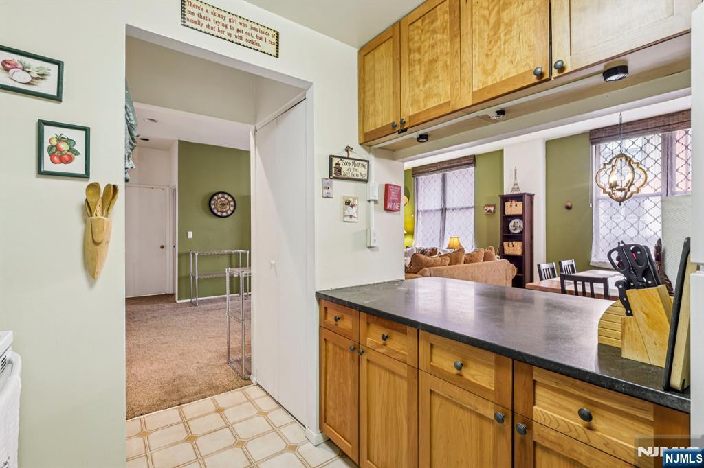 111 Mulberry Street, Unit 2V Newark, NJ 07102 - Photo 13 of 27 a view of a kitchen with furniture and a window