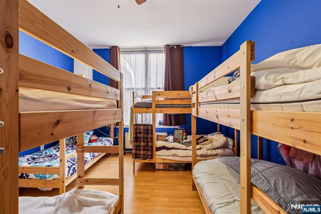 111 Mulberry Street, Unit 2V Newark, NJ 07102 - Photo 17 of 27 a view of living room with furniture and kitchen view