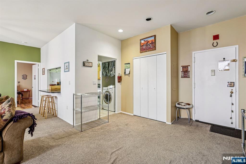 111 Mulberry Street, Unit 2V Newark, NJ 07102 - Photo 7 of 27 a view of livingroom with furniture and refrigerator