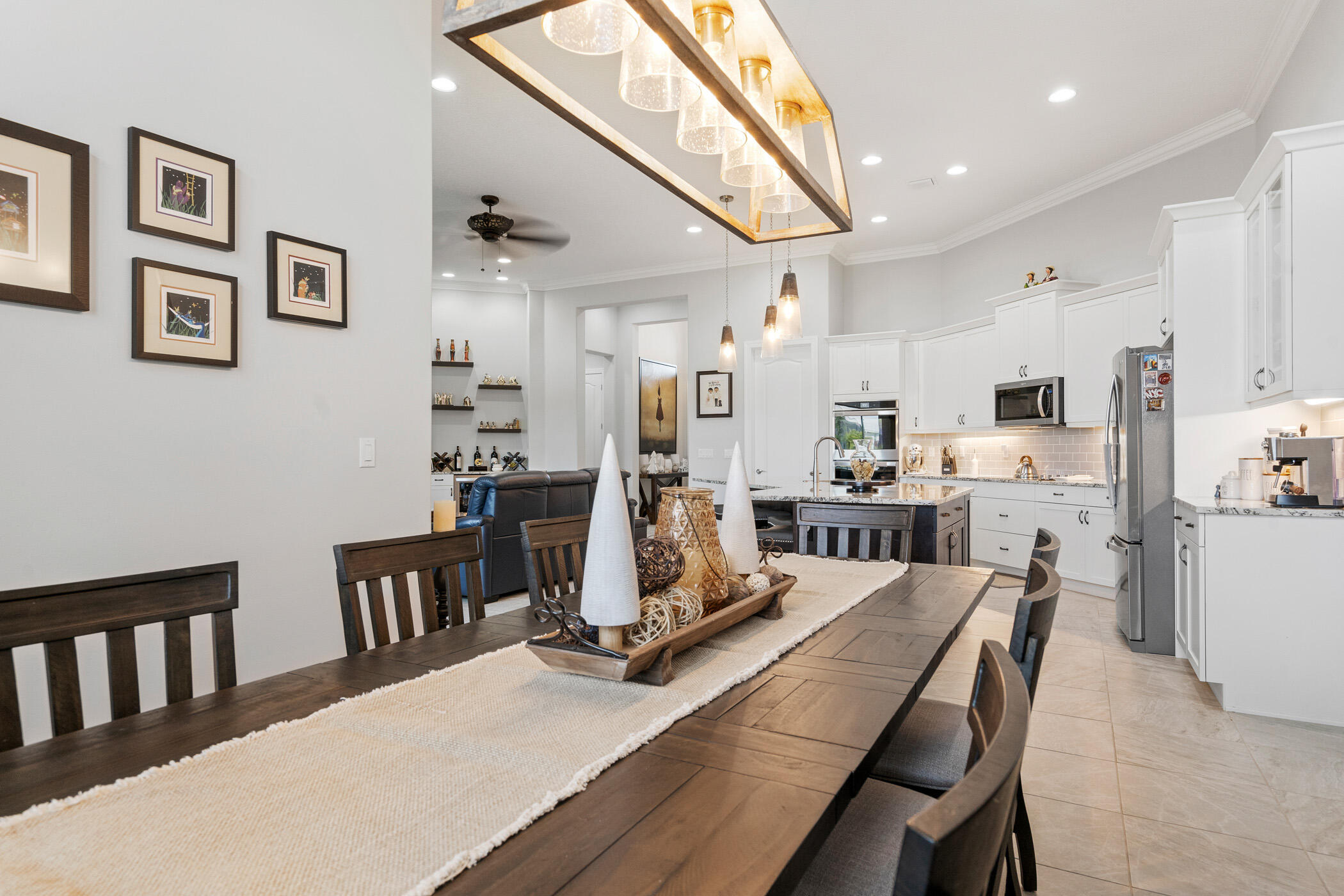 Undisclosed Address Vero Beach, FL 32967 - Photo 13 of 35 a view of a dining room with furniture and a wooden floor
