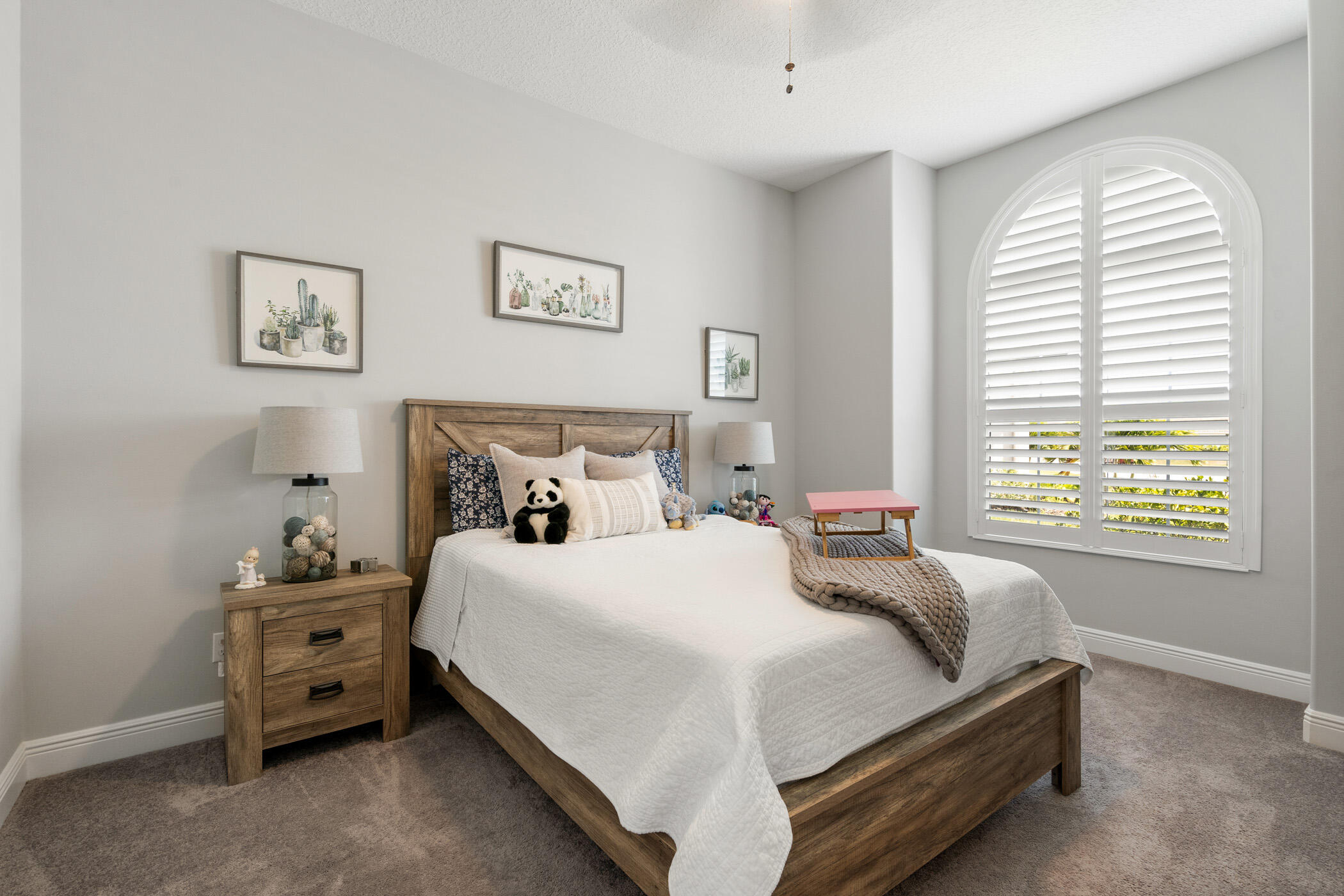 Undisclosed Address Vero Beach, FL 32967 - Photo 24 of 35 a bedroom with a bed and a window