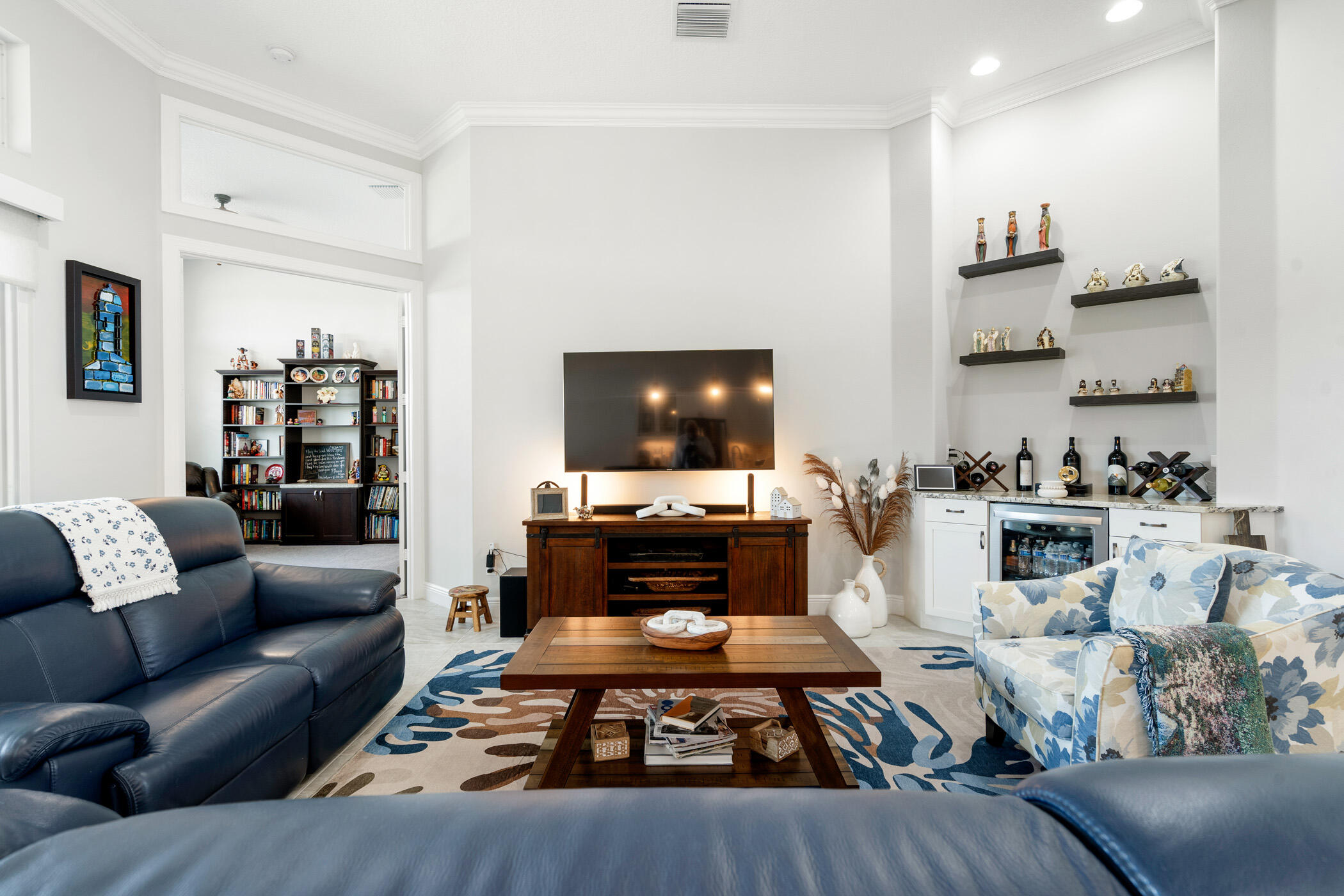 Undisclosed Address Vero Beach, FL 32967 - Photo 6 of 35 a living room with furniture and a flat screen tv