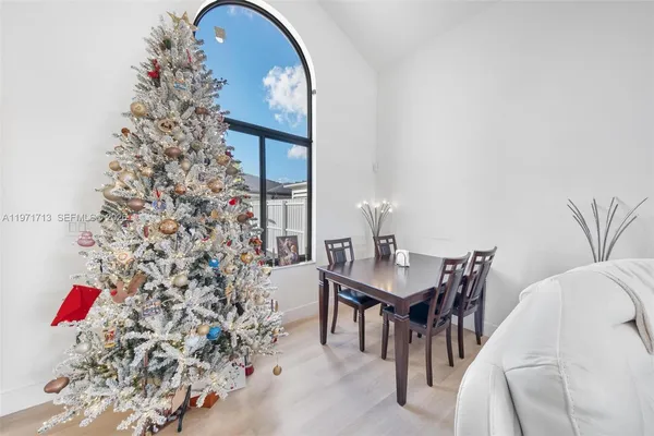 a view of a livingroom with furniture and window