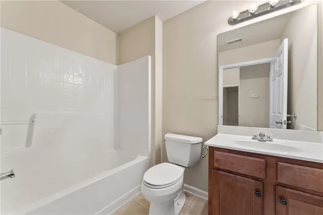 a view of front door with yard