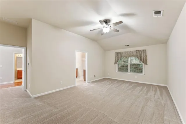 a spacious bathroom with a double vanity sink mirror and