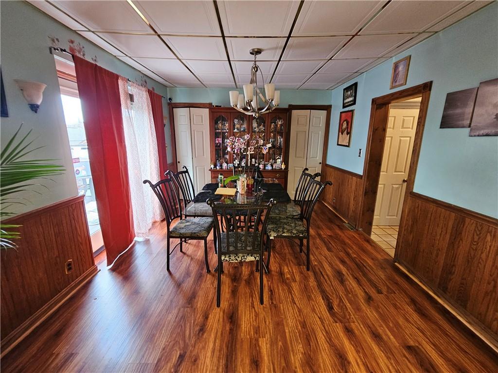 302 South Monroe Street Butler, PA 16001 - Photo 6 of 36 Large dining room area with sliding doors to the rear deck.