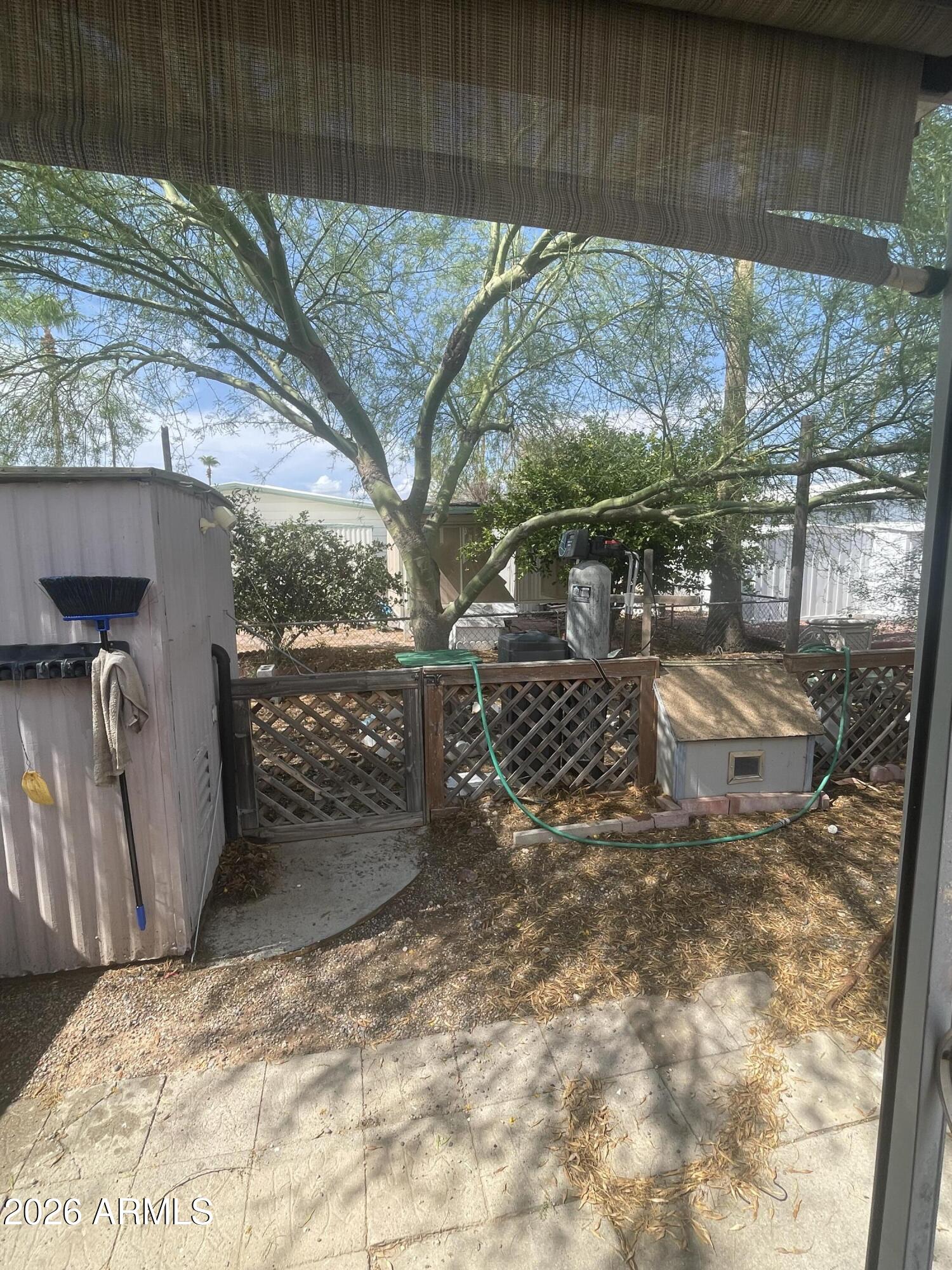 3405 South Tomahawk Road, Unit 139 Apache Junction, AZ 85119 - Photo 13 of 13 Shaded Backyard