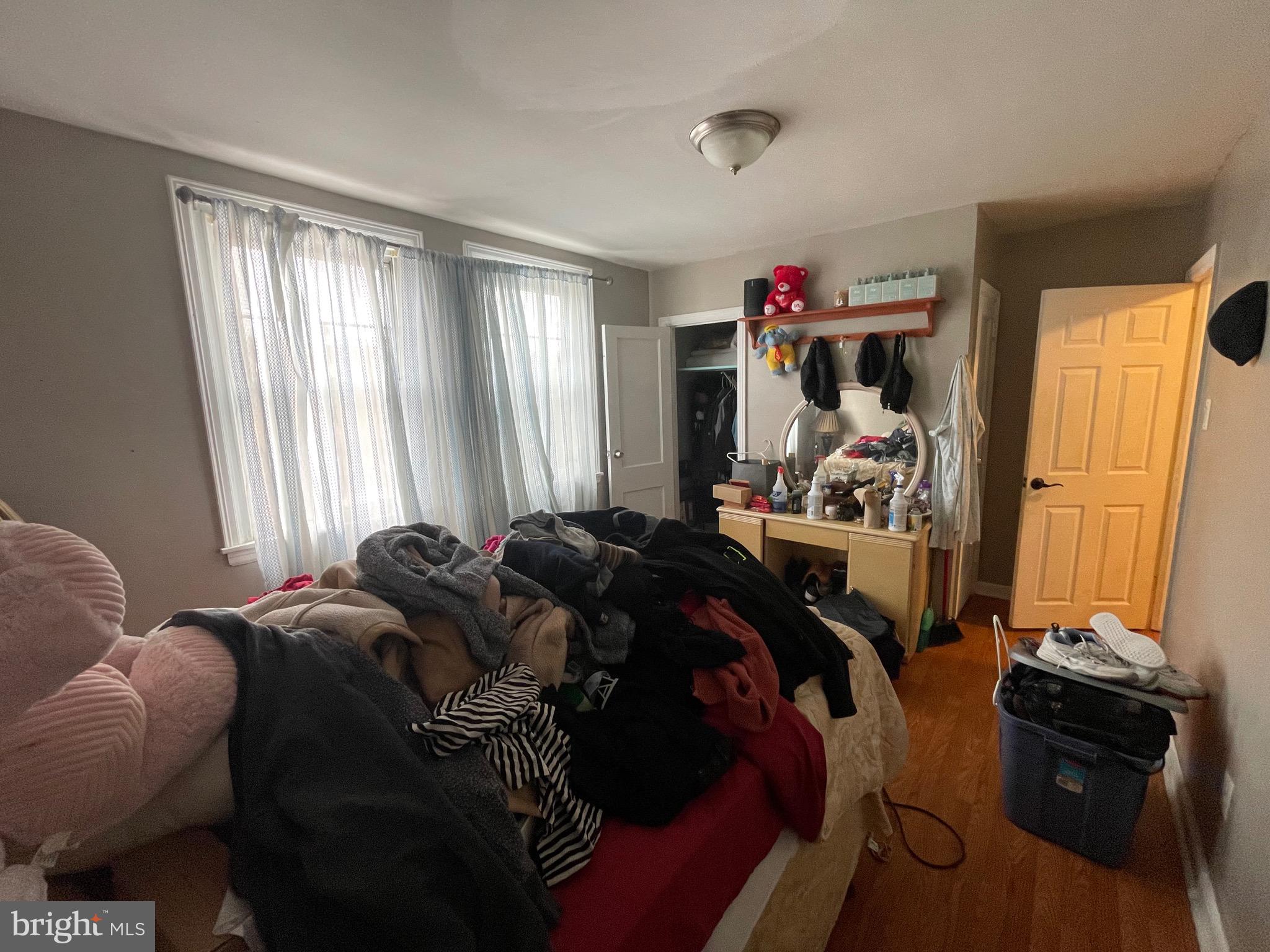 1141 Gilham Street Philadelphia, PA 19111 - Photo 11 of 16 a bed room with a bed and a window