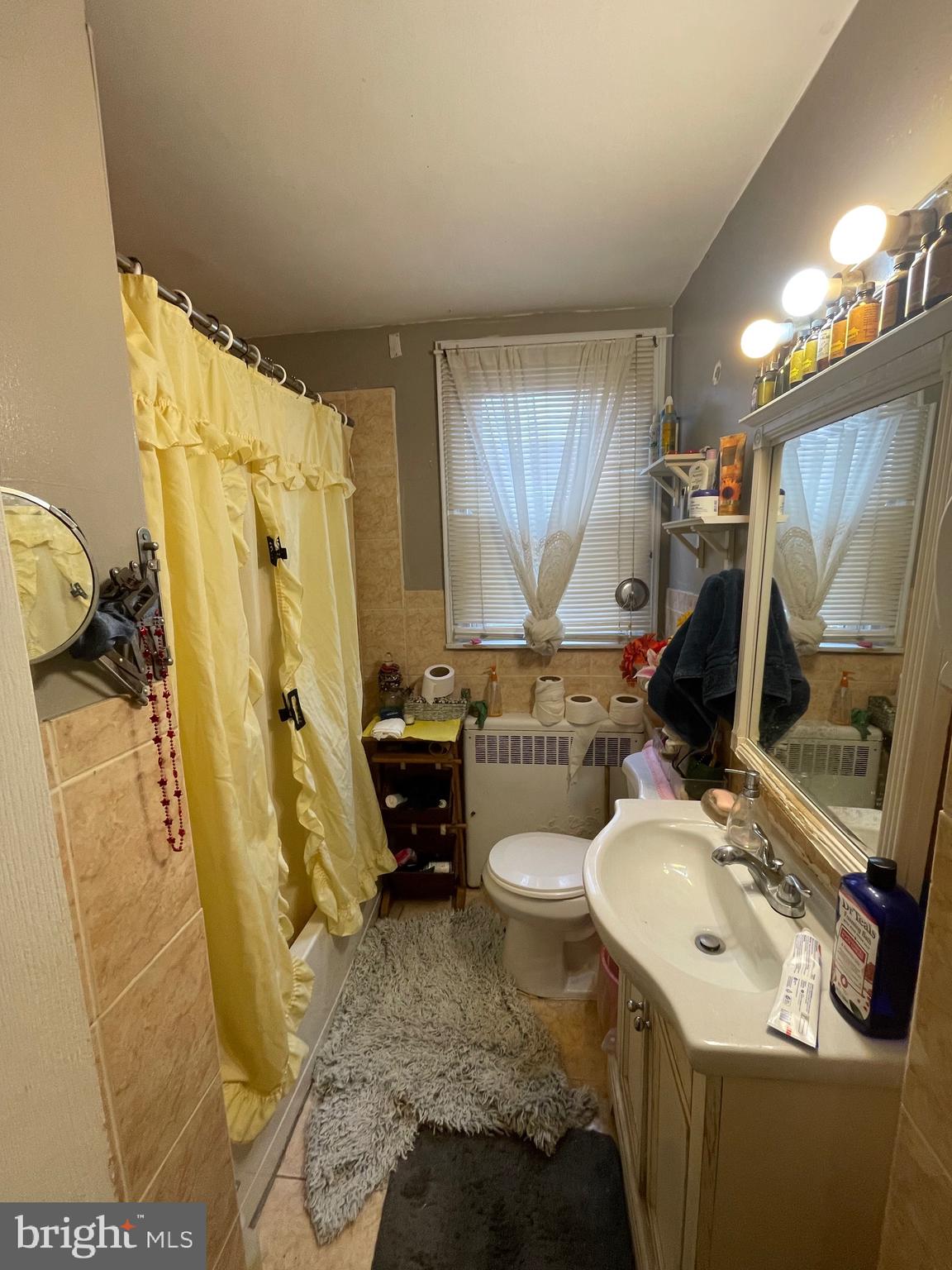 1141 Gilham Street Philadelphia, PA 19111 - Photo 6 of 16 a bathroom with a sink toilet and shower