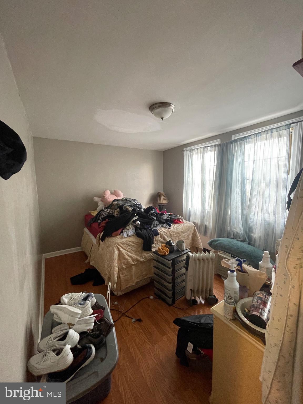 1141 Gilham Street Philadelphia, PA 19111 - Photo 10 of 16 a room with furniture and a window