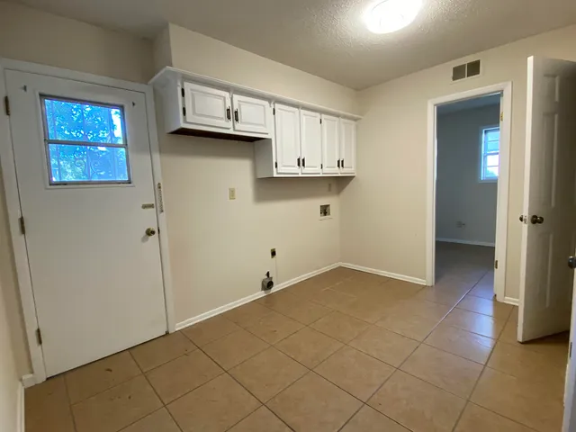 a view of a kitchen with a sink