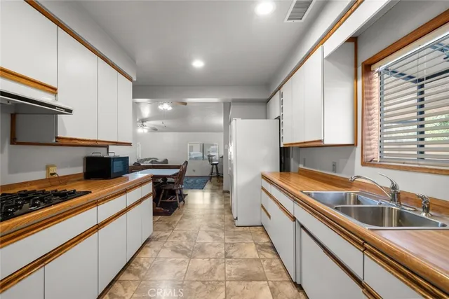 a workspace with furniture and window