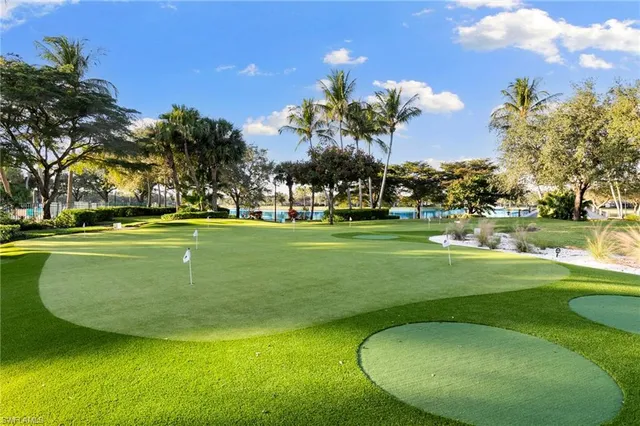 a view of a golf course with a swimming pool