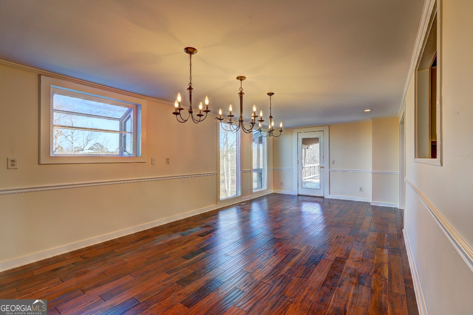 362 Brook Road Barnesville, GA 30204 - Photo 25 of 70 a view of a room with wooden floor chandelier and windows