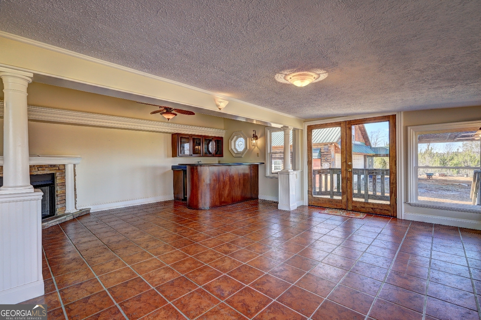 362 Brook Road Barnesville, GA 30204 - Photo 32 of 70 a view of an empty room with a window and wooden floor