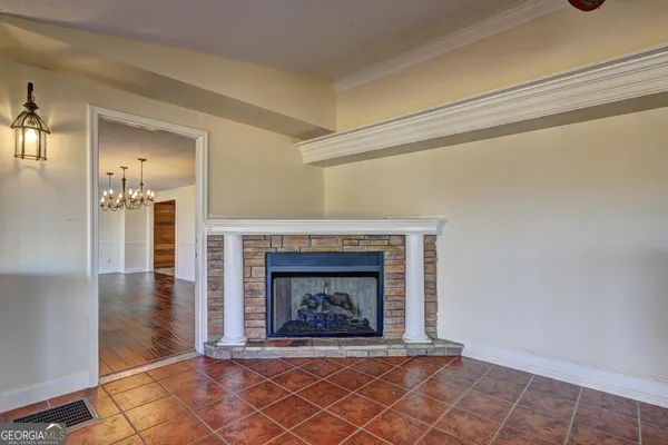 a view of a livingroom with wooden floor