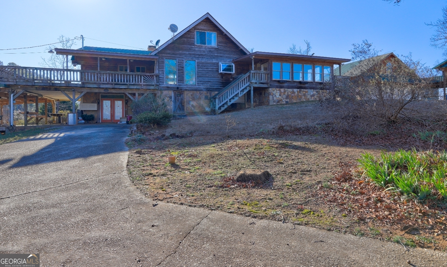 362 Brook Road Barnesville, GA 30204 - Photo 5 of 70 a view of a big house with a yard